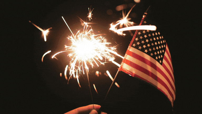 Animated sparkler glowing beside a small American flag against a dark background, creating a festive patriotic scene and other scenes from Honey Run Golf course.